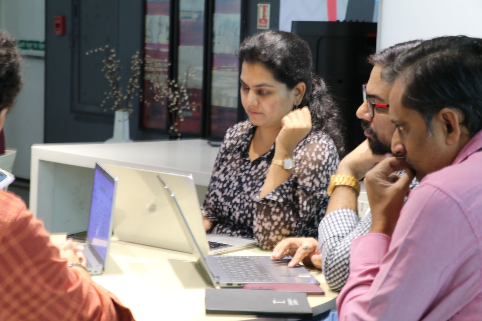An attendee thinking through a point at the Pune meetup