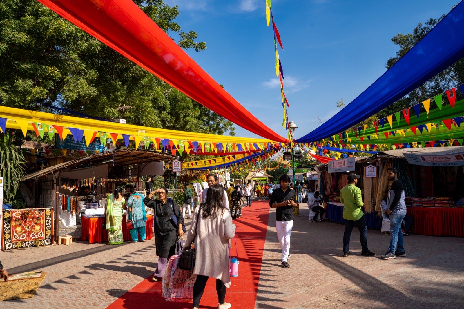 Colourful crafts and textiles displayed at Dilli Haat INA
